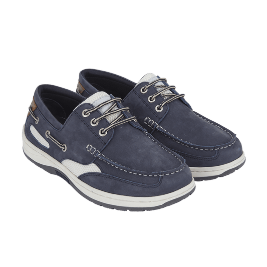 Pair of navy blue quayside boat shoes with white soles on a transparent background
