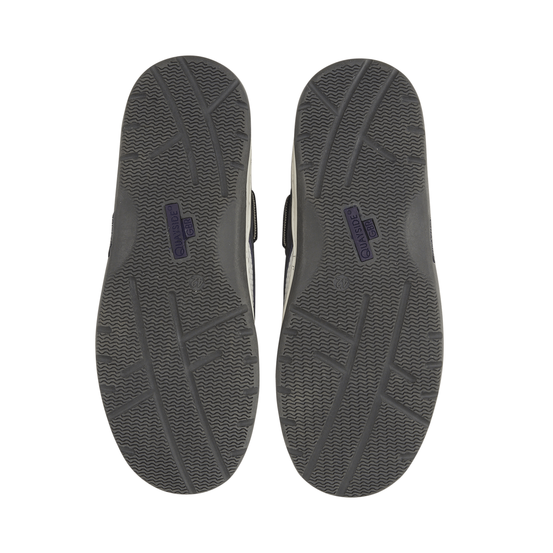 Gray shoe soles with a brand logo on a black background